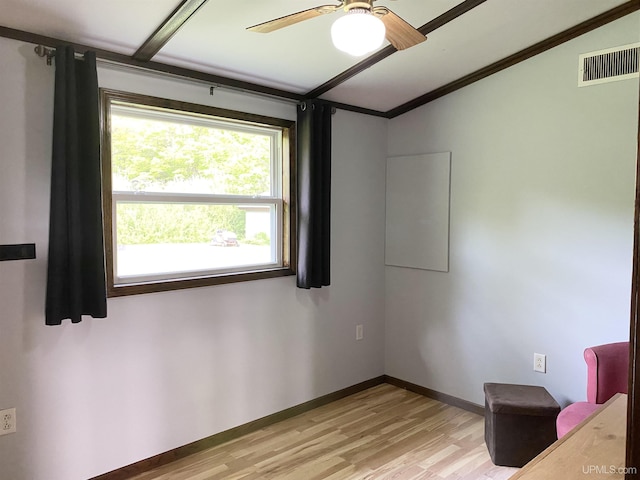 47275 Green Acres Rd, Houghton, MI 49931 - interior space with light wood-style floors, vaulted ceiling, ornamental molding, ceiling fan, and baseboards