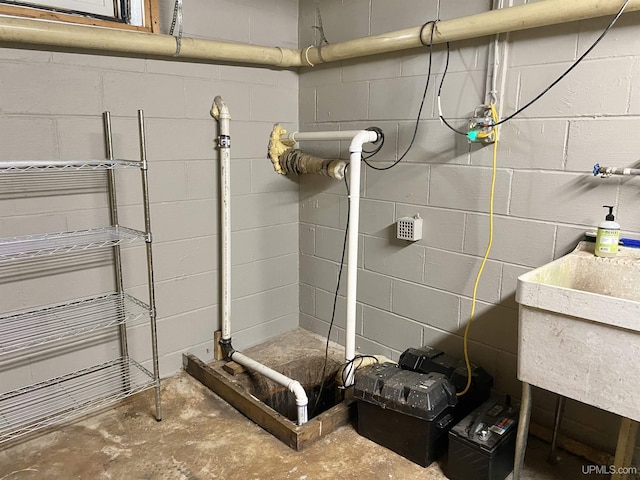 47275 Green Acres Rd, Houghton, MI 49931 - bathroom with concrete block wall and concrete floors