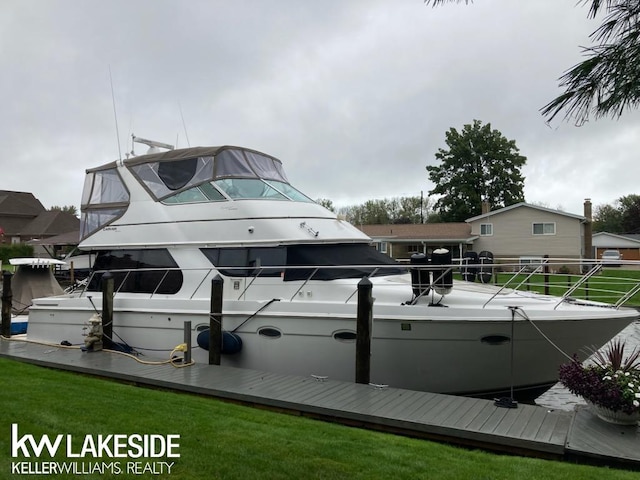 38044 Seaway Ct, Harrison Twp, MI 48045 - dock featuring a yard