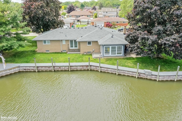 38044 Seaway Ct, Harrison Twp, MI 48045 - dock with a water view and a lawn