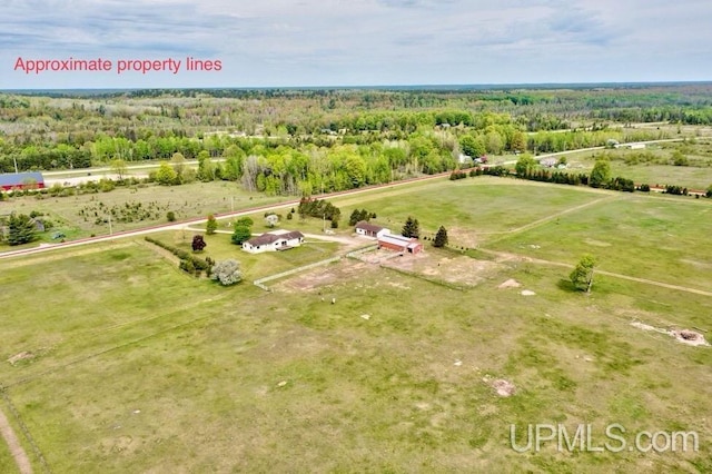 12104 T Rd, Rapid River, MI 49878 - aerial view of sparsely populated area with a heavily wooded area