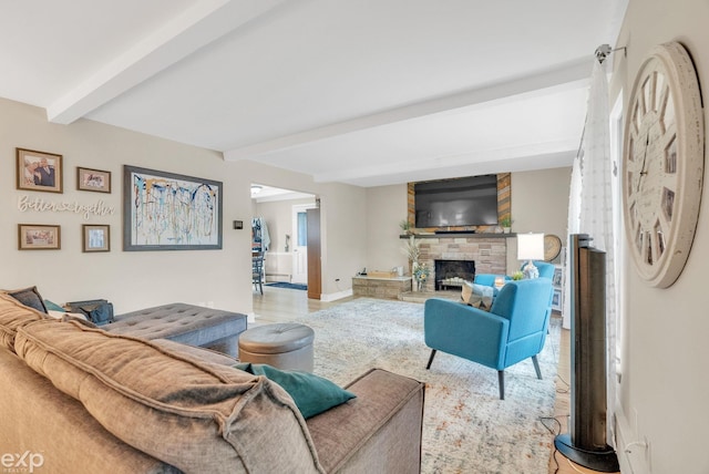 3365 Hickory Ln, Port Huron, MI 48060 - living room featuring beam ceiling, a stone fireplace, wood finished floors, and baseboards