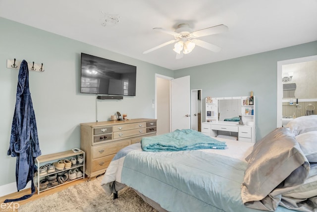 3365 Hickory Ln, Port Huron, MI 48060 - bedroom with light wood finished floors, ensuite bath, and ceiling fan