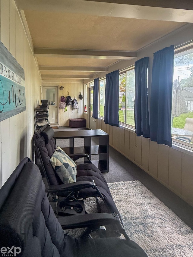 3365 Hickory Ln, Port Huron, MI 48060 - living room with carpet flooring, beam ceiling, and wood walls