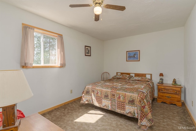4427 Tip Up Trl, Eagle River, WI 54521 - bedroom with carpet floors, baseboards, and a ceiling fan