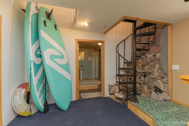 4427 Tip Up Trl, Eagle River, WI 54521 - hallway with stairs and carpet floors