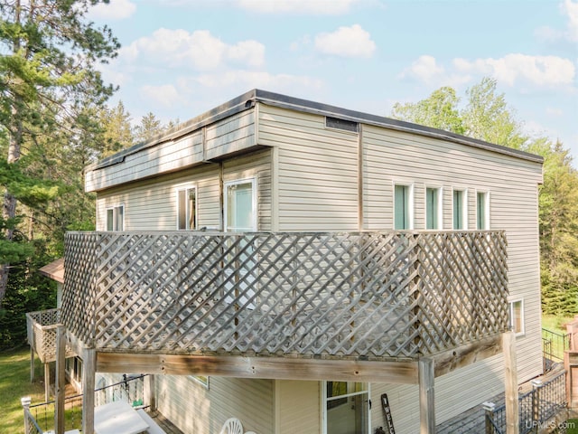 4427 Tip Up Trl, Eagle River, WI 54521 - view of side of property with a wooden deck