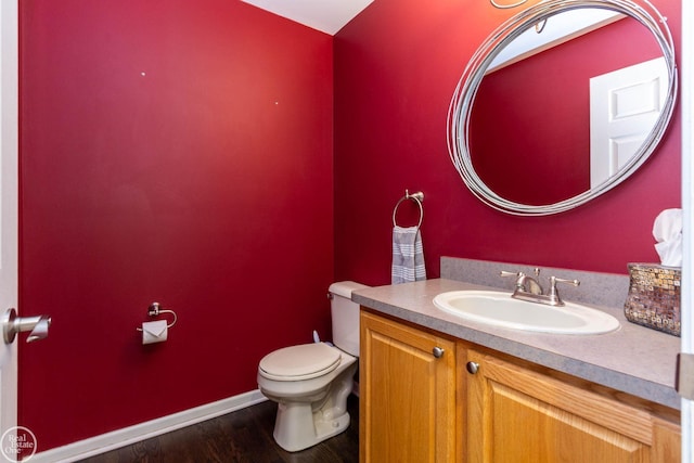 28815 Coleridge St, Harrison Twp, MI 48045 - bathroom featuring toilet, vanity, and wood finished floors