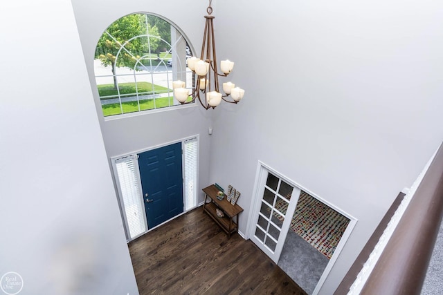28815 Coleridge St, Harrison Twp, MI 48045 - entrance foyer featuring a towering ceiling, a chandelier, and wood finished floors