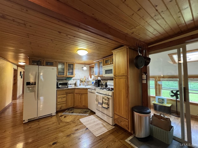 5452 W N Island Lake Rd, Hurley, WI 54534 - kitchen with white appliances, hardwood / wood-style flooring, wooden ceiling, glass insert cabinets, and a sink