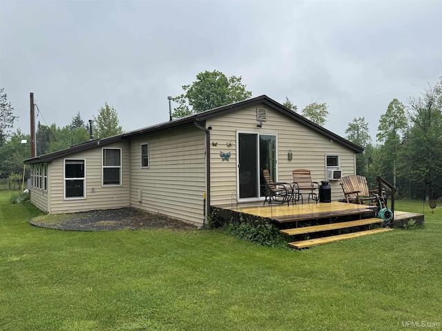 5452 W N Island Lake Rd, Hurley, WI 54534 - rear view of house with a wooden deck, a yard, and cooling unit