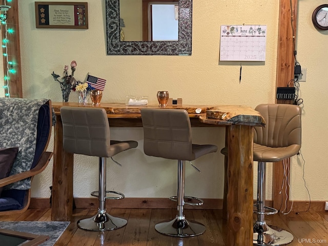 5452 W N Island Lake Rd, Hurley, WI 54534 - bar area featuring wood-type flooring