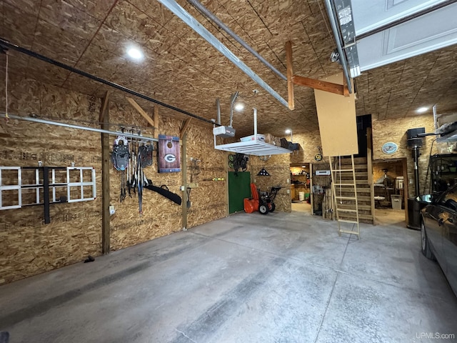 5452 W N Island Lake Rd, Hurley, WI 54534 - garage featuring a garage door opener