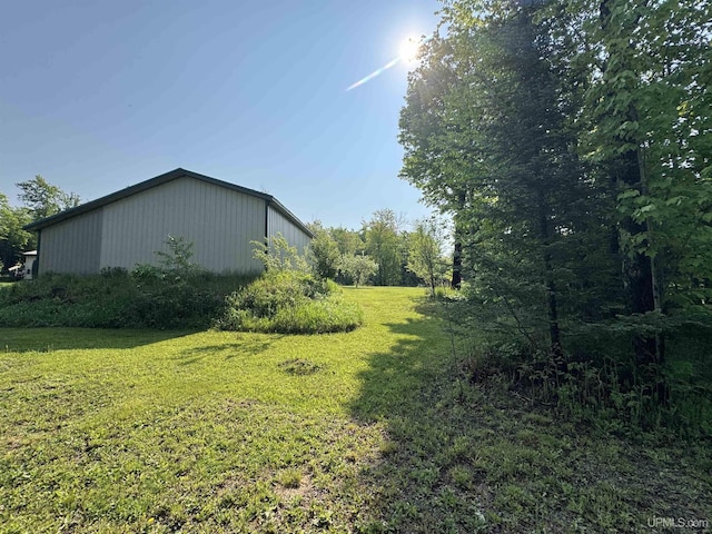 5452 W N Island Lake Rd, Hurley, WI 54534 - view of grassy yard featuring an outbuilding
