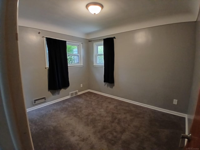 24675 Ridgecroft Ave, Eastpointe, MI 48021 - spare room featuring dark carpet and baseboards