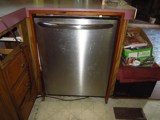 1984 E Marlette Rd, Applegate, MI 48401 - kitchen view of light flooring and stainless steel dishwasher