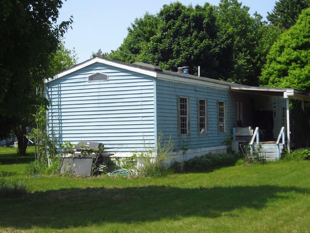 1984 E Marlette Rd, Applegate, MI 48401 - view of side of property featuring a yard