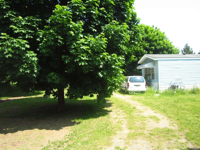 1984 E Marlette Rd, Applegate, MI 48401 - view of grassy yard featuring driveway