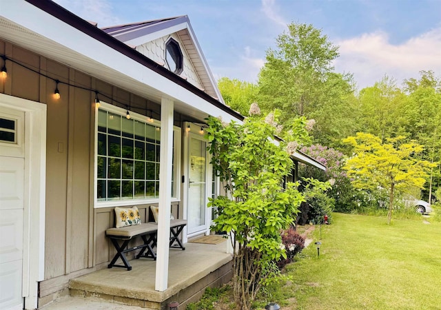 6223 E Townline Lake Rd, Harrison, MI 48625 - view of grassy yard featuring a porch