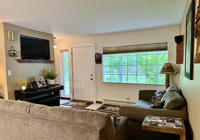 6223 E Townline Lake Rd, Harrison, MI 48625 - living area with a baseboard heating unit