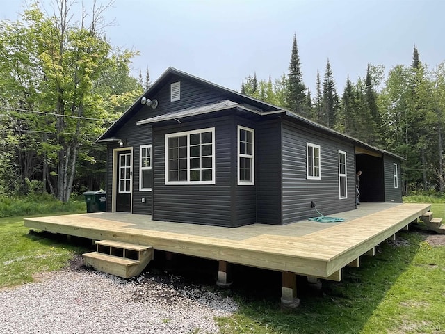 2731 W Jones Rd, Gulliver, MI 49840 - view of side of property with a deck
