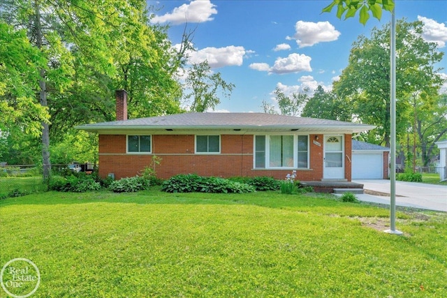 18467 Pershing St, Livonia, MI 48152 - ranch-style house featuring brick siding, a chimney, and a garage