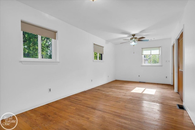 18467 Pershing St, Livonia, MI 48152 - unfurnished room featuring ceiling fan, light wood-style flooring, and baseboards