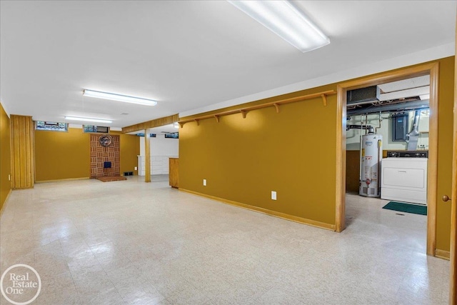 18467 Pershing St, Livonia, MI 48152 - finished below grade area with washer / dryer, gas water heater, electric panel, light flooring, and baseboards