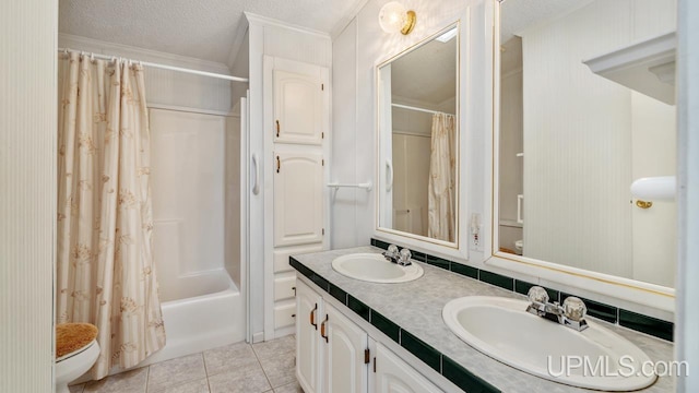 2600 S Hill Rd, Gladstone, MI 49837 - bathroom featuring double vanity, toilet, tile patterned floors, shower / bath combo, and a textured ceiling