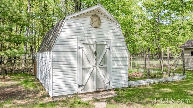 2600 S Hill Rd, Gladstone, MI 49837 - view of shed with view of scattered trees