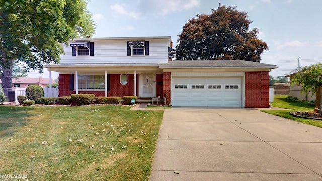 11493 Briarcliff Dr, Warren, MI 48093 - traditional-style house featuring brick siding, a garage, driveway, and covered porch