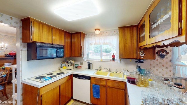 11493 Briarcliff Dr, Warren, MI 48093 - kitchen featuring dishwashing machine, black microwave, white electric cooktop, a sink, and light countertops