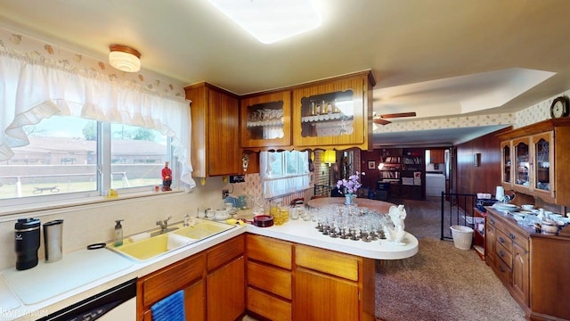 11493 Briarcliff Dr, Warren, MI 48093 - kitchen with dishwasher, a peninsula, a sink, ceiling fan, and light countertops