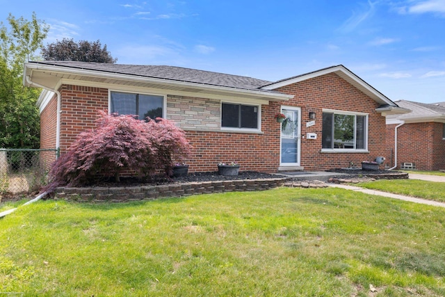 13040 Common Rd, Warren, MI 48088 - view of front facade featuring brick siding and roof with shingles