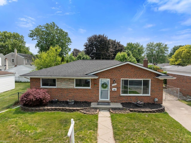 13040 Common Rd, Warren, MI 48088 - bungalow-style home featuring brick siding, a gate, roof with shingles, and a chimney