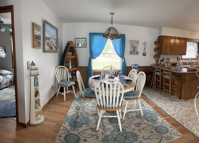 3045 W Lakeside Dr, West Branch, MI 48661 - dining space featuring healthy amount of natural light, light wood-style floors, and ceiling fan