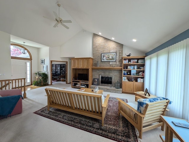 5663 Macintosh Dr, Bay City, MI 48706 - living area with a brick fireplace, high vaulted ceiling, a ceiling fan, light colored carpet, and recessed lighting