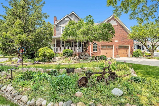 33473 Mulvey Rd, Fraser, MI 48026 - view of front of home with brick siding, a porch, driveway, a chimney, and a garage