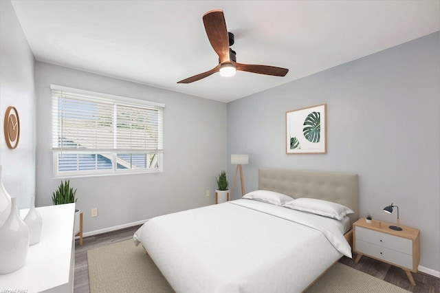 33473 Mulvey Rd, Fraser, MI 48026 - bedroom with wood finished floors, baseboards, and ceiling fan