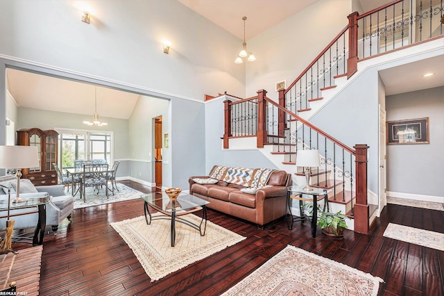 33473 Mulvey Rd, Fraser, MI 48026 - living area featuring a chandelier, high vaulted ceiling, baseboards, stairway, and wood-type flooring