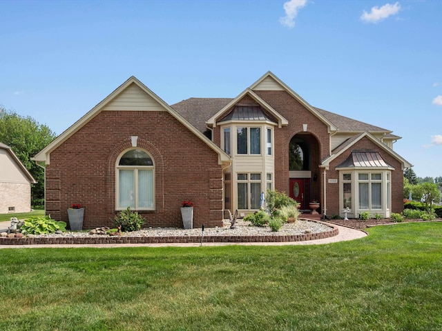 15158 Towering Oaks Dr, Shelby Twp, MI 48315 - view of front facade with brick siding and a front yard