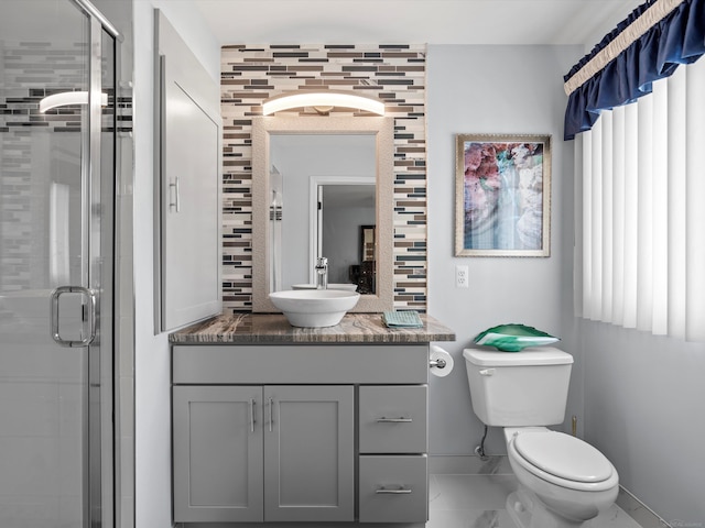 15158 Towering Oaks Dr, Shelby Twp, MI 48315 - full bathroom featuring vanity, baseboards, a shower stall, and toilet
