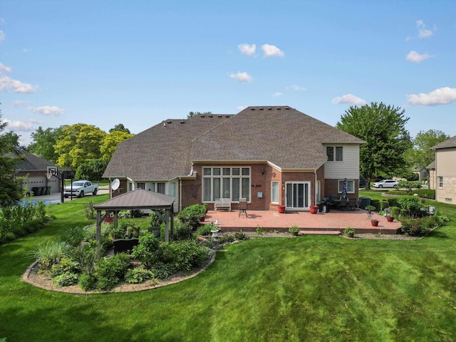 15158 Towering Oaks Dr, Shelby Twp, MI 48315 - back of property featuring a gazebo, a patio, a yard, brick siding, and a shingled roof