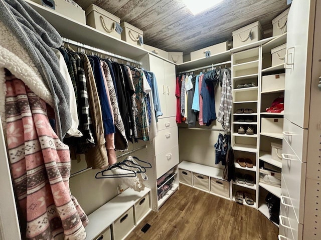 6586 N Coleman Rd, Coleman, MI 48618 - spacious closet with dark wood-type flooring