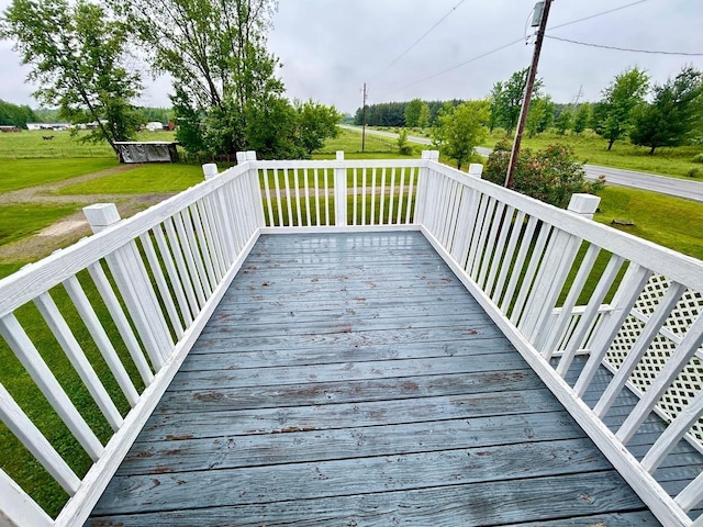 6586 N Coleman Rd, Coleman, MI 48618 - wooden terrace with a lawn
