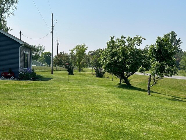 6586 N Coleman Rd, Coleman, MI 48618 - view of grassy yard
