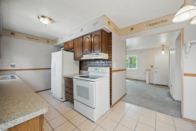 31565 Hayes Rd, Warren, MI 48088 - kitchen featuring white appliances, under cabinet range hood, light colored carpet, light countertops, and baseboards