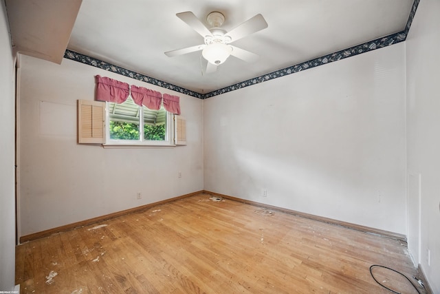 31565 Hayes Rd, Warren, MI 48088 - unfurnished room with light wood-style floors, baseboards, and a ceiling fan