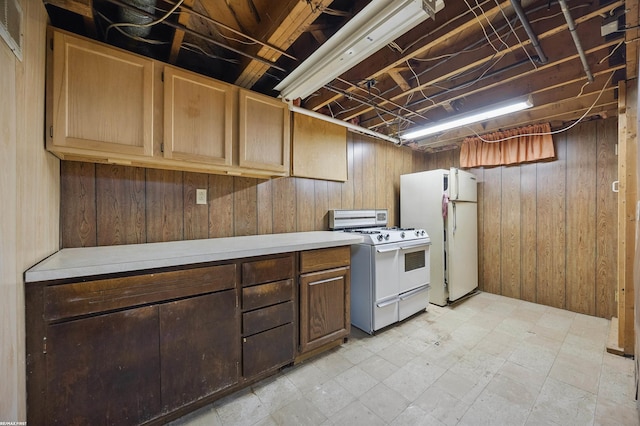 31565 Hayes Rd, Warren, MI 48088 - kitchen with white appliances, light countertops, wooden walls, and light floors