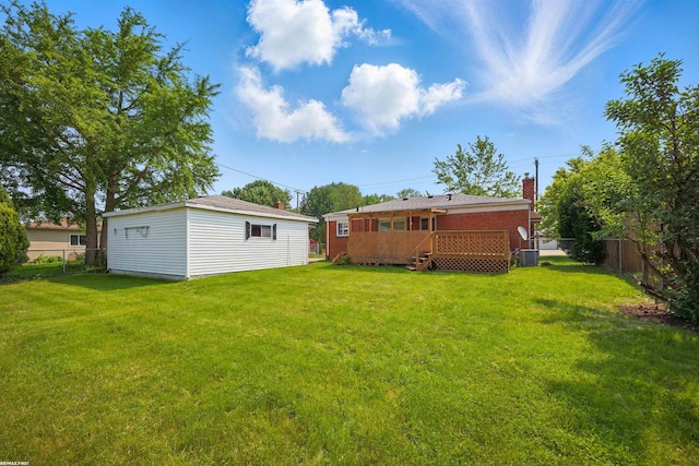 31565 Hayes Rd, Warren, MI 48088 - view of yard featuring a deck and an outbuilding